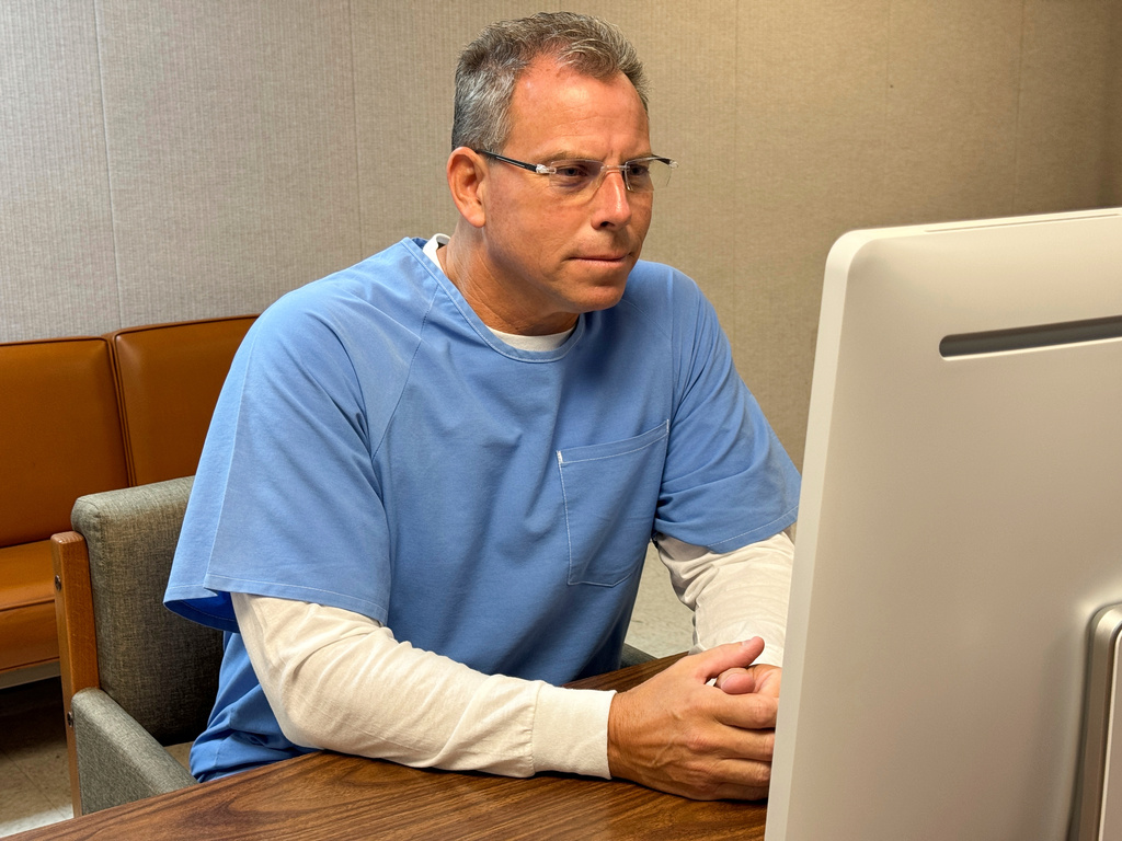 FILE - Erik Menendez appears before the parole board via teleconference Aug. 21, 2025, at the Richard J. Donovan Correctional Facility in San Diego. (California Department of Corrections via AP, File)