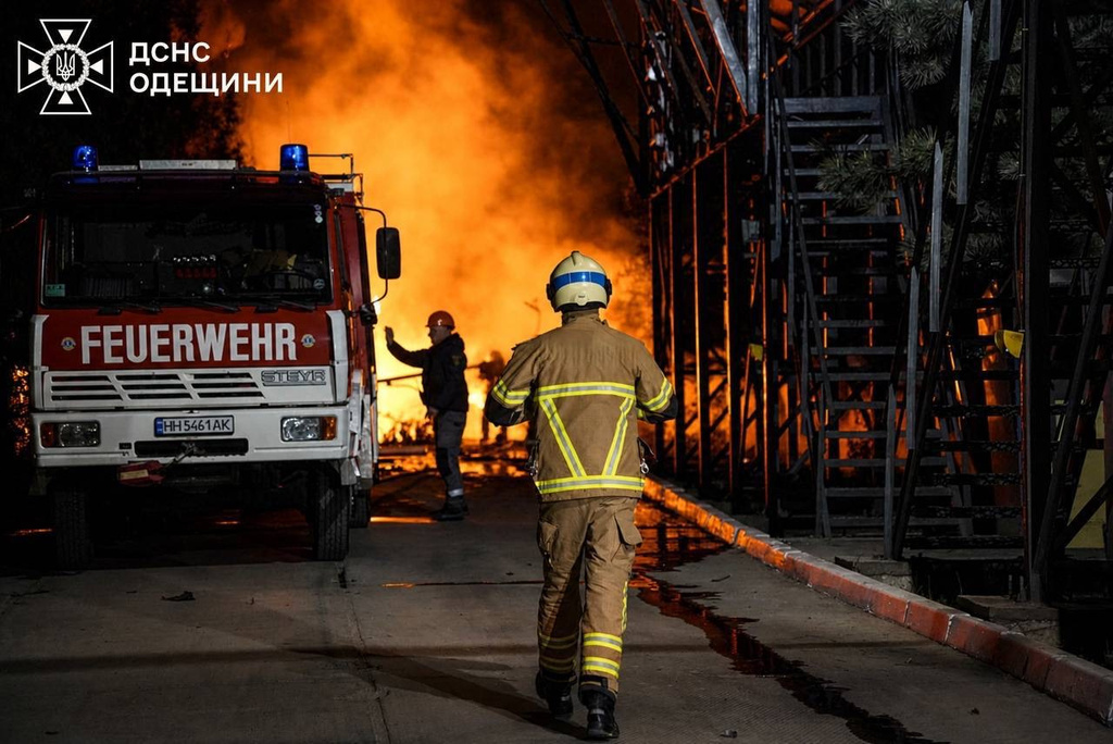 Ukrainian emergency crew responds to a fire in Ukraine's southern Odesa region after Russian attack overnight on Sunday, May 3, 2026. (Ukrainian Emergency Service via AP)
