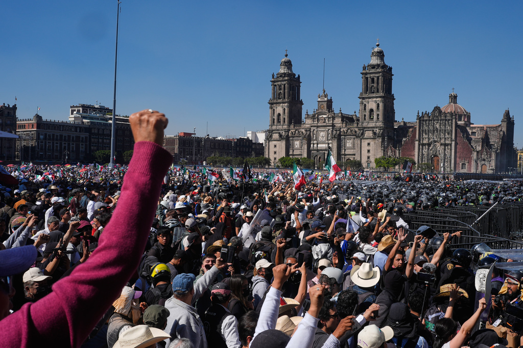 Protesters take part in a youth anti-government march in Mexico City, Saturday, Nov. 15, 2025. (AP Photo/Marco Ugarte)