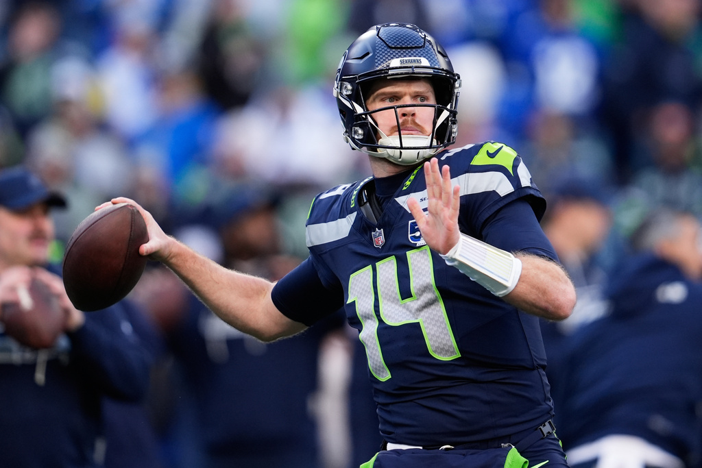 Seattle Seahawks quarterback Sam Darnold warms up before the NFC Championship NFL football game against the Los Angeles Rams, Sunday, Jan. 25, 2026, in Seattle. (AP Photo/Godofredo A. Vásquez)