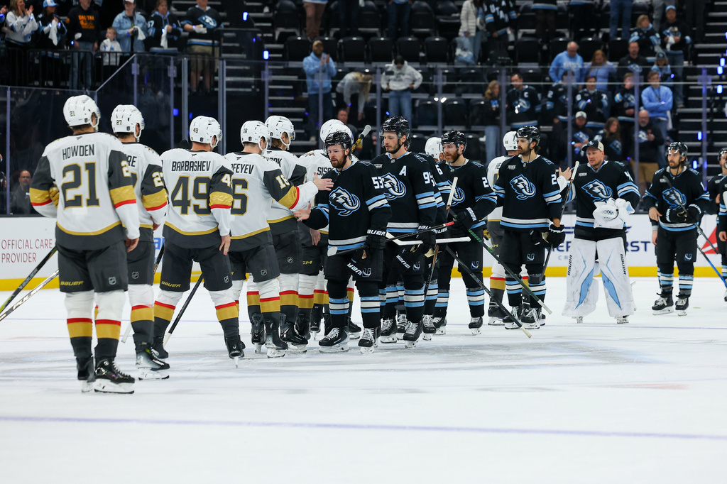 Utah Mammoth congratulate the Vegas Golden Knights after the game win to advance of Game 6 in the first round of an NHL hockey Stanley Cup playoff series, Friday, May 1, 2026, in Salt Lake City. (AP Photo/Melissa Majchrzak)