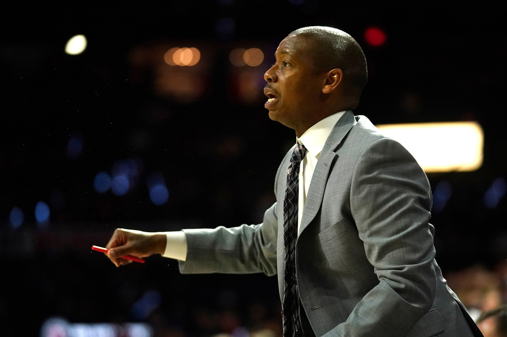 FILE - Arizona assistant coach Justin Gainey gestures during the second half of an NCAA college basketball game against Washington State on March 5, 2020, in Tucson, Ariz. (AP Photo/Rick Scuteri, File)