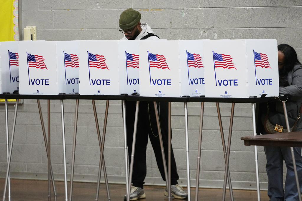 FILE - Voters fill out their ballots Nov. 4, 2025, in Detroit. (AP Photo/Paul Sancya, File)