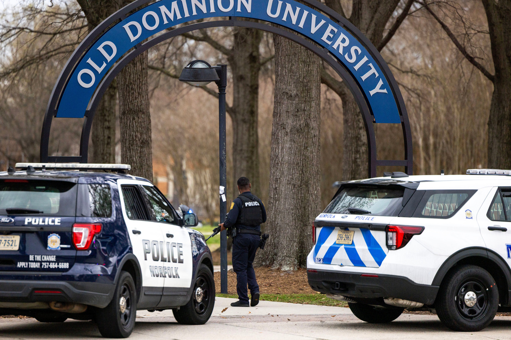 FILE - Police arrive outside Old Dominion University's campus after reports of an active shooter on March 12, 2026 in Norfolk, Va. (Kendall Warner/The Virginian-Pilot via AP, File)