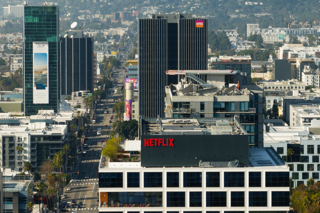 A Netflix sign is displayed atop a building in Los Angeles, Thursday, Dec. 18, 2025. (AP Photo/Jae C. Hong)