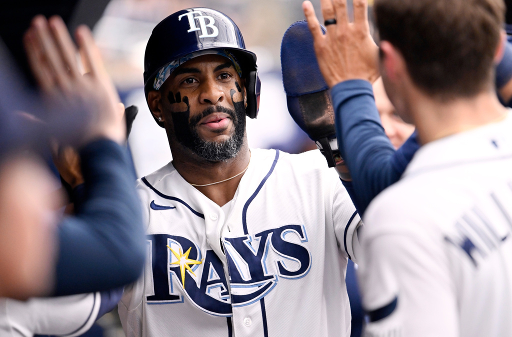 Tampa Bay Rays' Yandy Díaz celebrates after scoring on a double by Jonathan Aranda, not pictured, during the third inning of a baseball game Saturday, July 11, 2026, in St. Petersburg, Fla. (AP Photo/Jason Behnken)