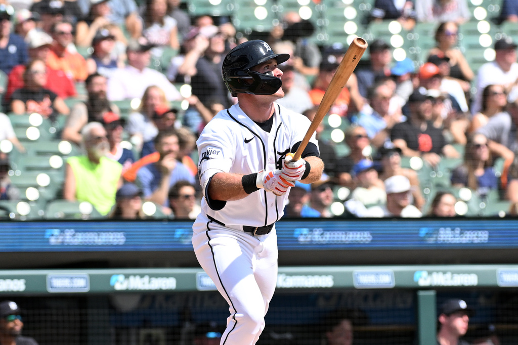 Detroit Tigers' Kevin McGonigle watches after hitting a triple during the second inning of a baseball game against the Colorado Rockies, Sunday, Sept. 13, 2026, in Detroit. (AP Photo/Jose Juarez)