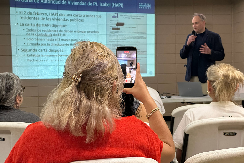 Community members attended a public forum, Feb. 19, 2026, at the Port Isabel Community Center in Port Isabel, Texas, to hear about tenant rights from Eric Dunn, an attorney with National Housing Law Project. (AP Photo/Valerie Gonzalez)