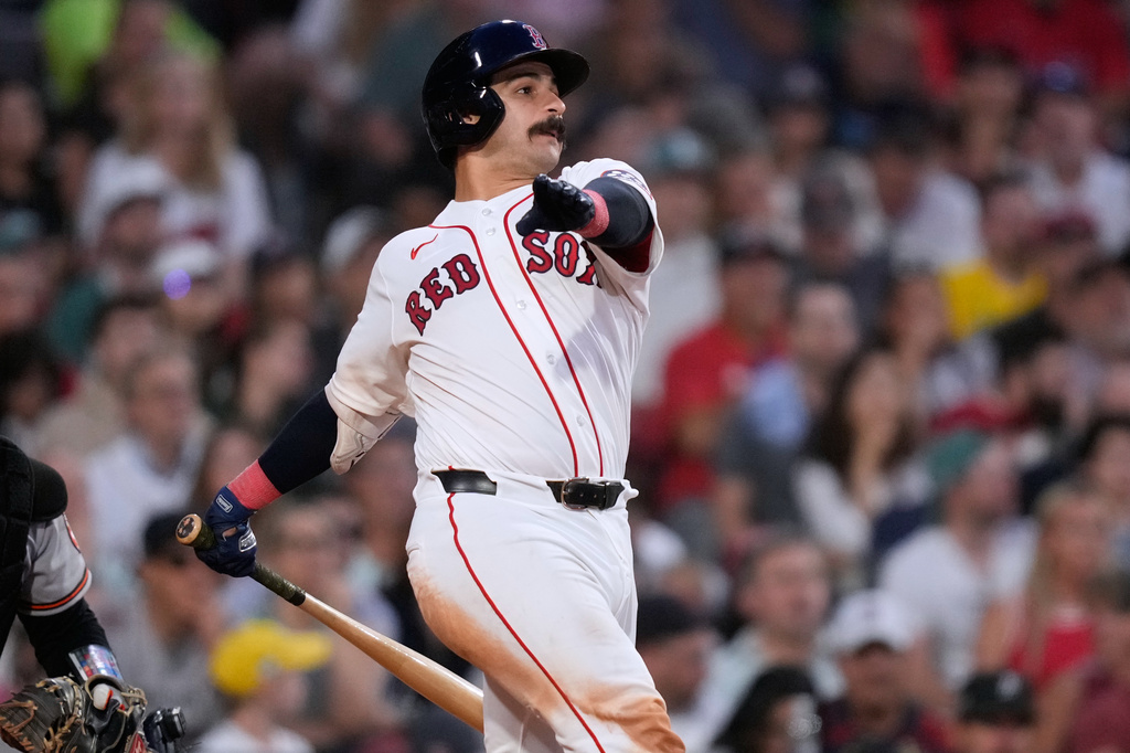 Boston Red Sox's Mickey Gasper watches the flight of his two-run triple during the fifth inning of a baseball game against the Baltimore Orioles, Wednesday, June 3, 2026, in Boston. (AP Photo/Charles Krupa)