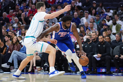 Philadelphia 76ers' Joel Embiid, right, tries to get past Charlotte Hornets' Ryan Kalkbrenner during the first half of an NBA basketball game Saturday, Oct. 25, 2025, in Philadelphia. (AP Photo/Matt Slocum) Philadelphia 76ers' Joel Embiid, right, tries to get past Charlotte Hornets' Ryan Kalkbrenner during the first half of an NBA basketball game Saturday, Oct. 25, 2025, in Philadelphia. (AP Photo/Matt Slocum)