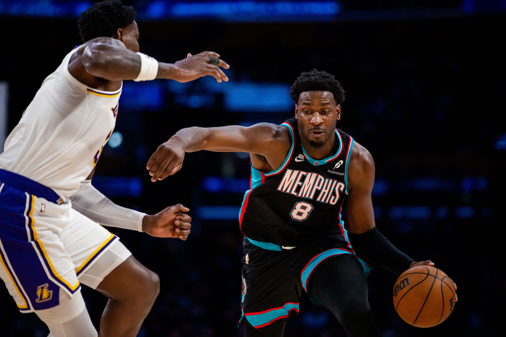 Memphis Grizzlies forward Jaren Jackson Jr. (8) drives against the Los Angeles Lakers during the first half of an NBA basketball game Sunday, Jan. 4, 2026, in Los Angeles. (AP Photo/Ethan Swope)