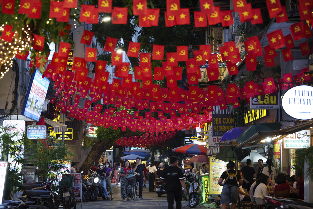 Vietnam's national flag displayed as the nation celebrating Vietnam's 80th National Day in Hanoi, Friday, Aug. 29, 2025. (AP Photo/Vincent Thian)