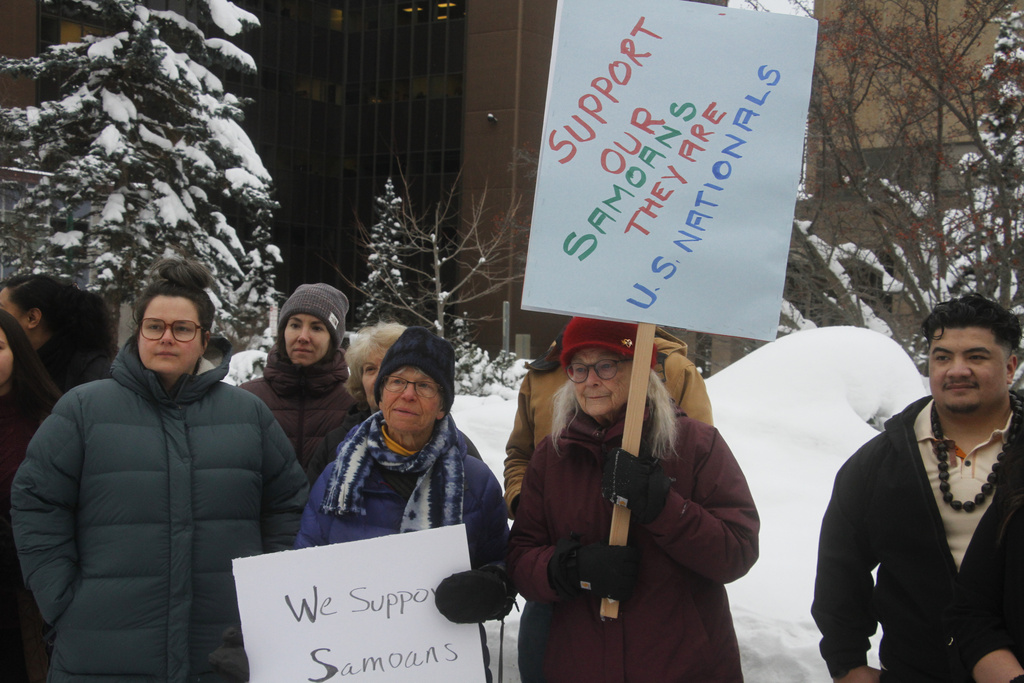 Supporters of Tupe Smith gather outside the Boney Courthouse in Anchorage, Alaska, Thursday, Jan. 15, 2026, ahead of the Alaska Court of Appeals hearing a challenge to the voter misconduct case brought against American Samoa native Tupe Smith by the state. (AP Photo/Mark Thiessen)