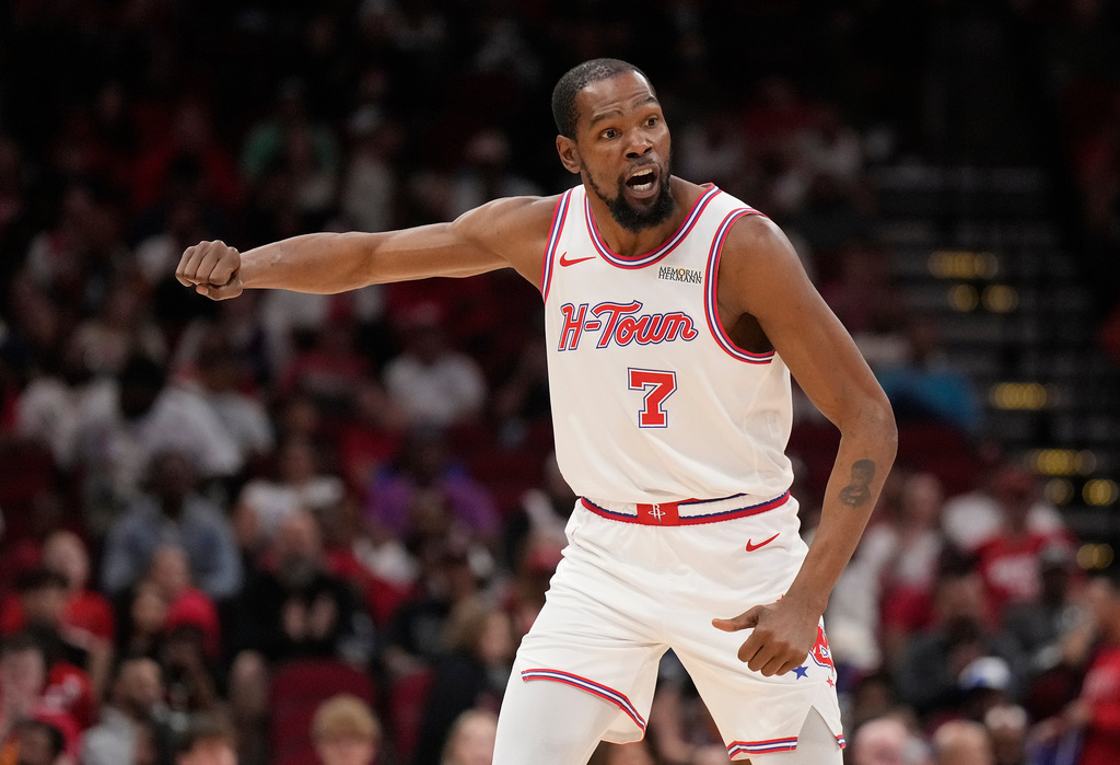 Houston Rockets forward Kevin Durant (7) reacts during the first half of an NBA basketball game against the Minnesota Timberwolves, Friday, April 10, 2026, in Houston. (AP Photo/ Karen Warren)