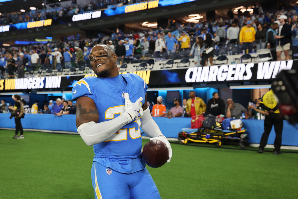 Los Angeles Chargers safety Tony Jefferson (23) celebrates after intercepting a pass during overtime of an NFL football game against the Philadelphia Eagles, Monday, Dec. 8, 2025, in Inglewood, Calif. (AP Photo/Kevork Djansezian)