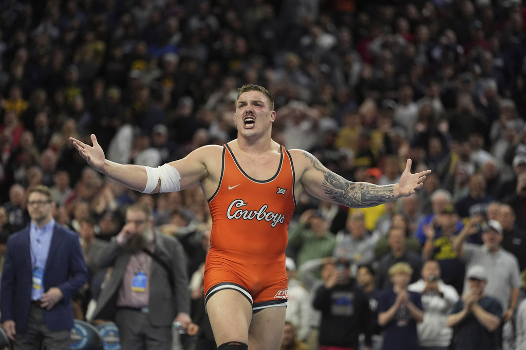 FILE - Oklahoma State's Wyatt Hendrickson reacts after defeating Minnesota's Gable Steveson during a 285-pound match in the finals at the NCAA wrestling championship, Saturday, March 22, 2025, in Philadelphia. (AP Photo/Matt Rourke, file)