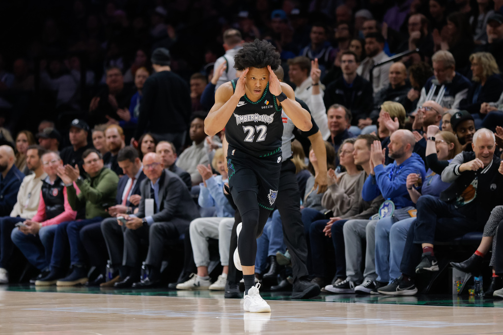 Minnesota Timberwolves guard Jaylen Clark (22) celebrates after making a 3-point basket during the first half of an NBA basketball game against the Atlanta Hawks, Monday, Feb. 9, 2026, in Minneapolis. (AP Photo/Bailey Hillesheim)