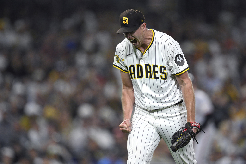 San Diego Padres starting pitcher Nick Pivetta reacts after a strikeout to end the top of the sixth inning of a baseball game against the San Francisco Giants Tuesday, Aug. 19, 2025, in San Diego. (AP Photo/Orlando Ramirez)