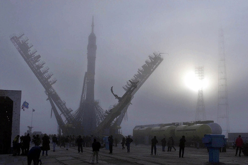FILE - The Soyuz booster is mounted to the launch pad at the Baikonur cosmodrome, Kazakstan, Sunday, Oct. 29, 2000, ahead of the launch of U.S. astronaut Bill Shepherd, and Russian cosmonauts Sergei Krikalyov and Yuri Gidzenko to be the first residents on the International Space Station. (AP Photo/Mikhail Metzel, File) FILE - The Soyuz booster is mounted to the launch pad at the Baikonur cosmodrome, Kazakstan, Sunday, Oct. 29, 2000, ahead of the launch of U.S. astronaut Bill Shepherd, and Russian cosmonauts Sergei Krikalyov and Yuri Gidzenko to be the first residents on the International Space Station. (AP Photo/Mikhail Metzel, File)