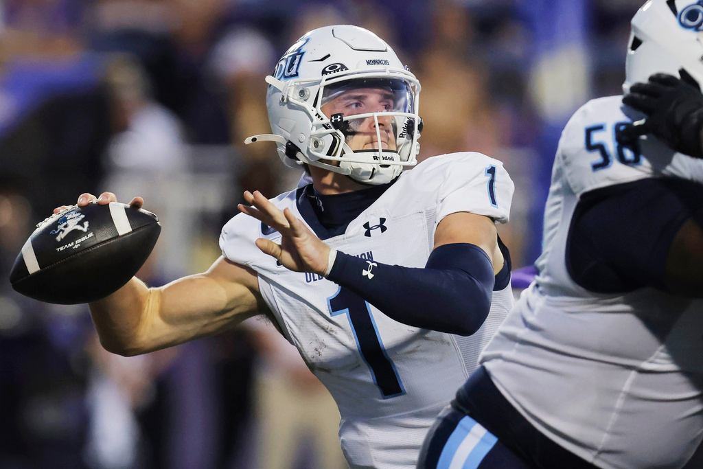 FILE - Old Dominion quarterback Colton Joseph (1) looks to pass during an NCAA football game against James Madison on Oct. 18, 2025, in Harrisonburg, Va. (AP Photo/Mike Buscher, File)