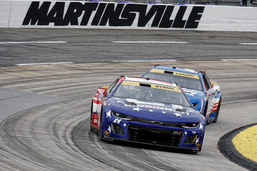 William Byron (24) leads Kyle Larson (5) during a NASCAR Cup series auto race in Martinsville, Va., Sunday, Oct. 26, 2025. (AP Photo/Terry Renna) William Byron (24) leads Kyle Larson (5) during a NASCAR Cup series auto race in Martinsville, Va., Sunday, Oct. 26, 2025. (AP Photo/Terry Renna)