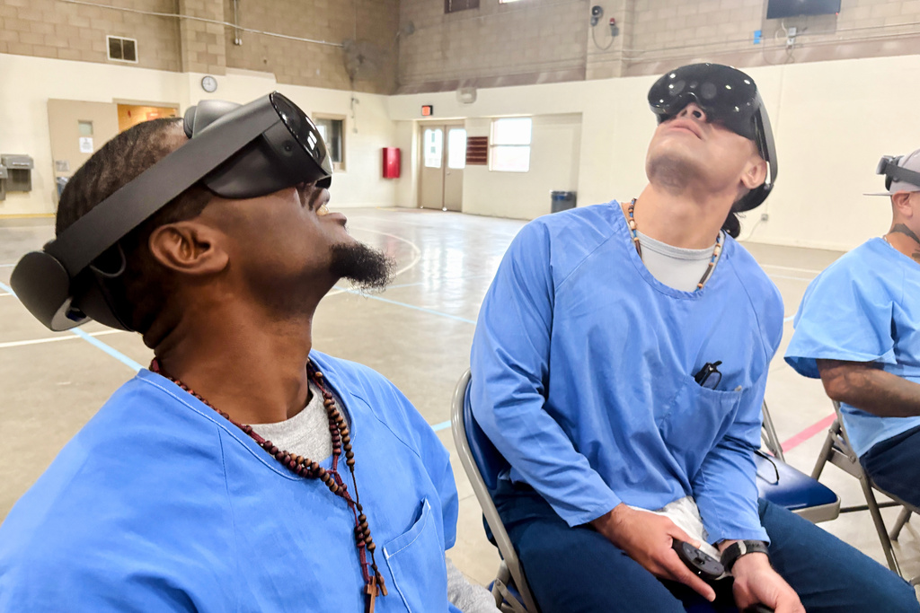 Incarcerated men use virtual reality headsets inside Valley State Prison in Chowchilla, Calif., Dec. 11, 2025. (AP Photo/Haven Daley)