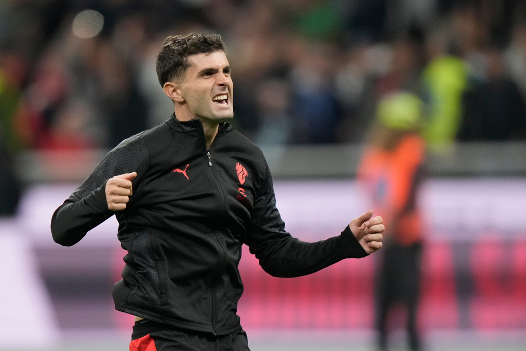 AC Milan's Christian Pulisic celebrates after the Serie A soccer match between AC Milan and Napoli at the San Siro stadium in Milan, Italy, Sunday, Sept. 28, 2025. (AP Photo/Luca Bruno)