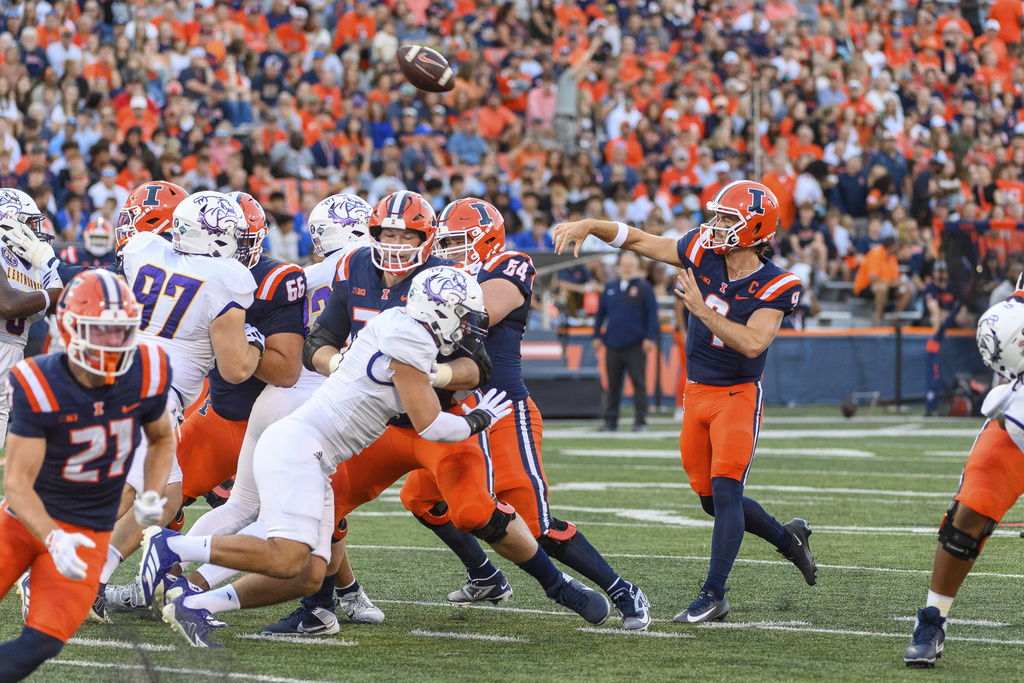 Illinois quarterback Luke Altmyer (9) passes during the first half of an NCAA college football game against Western Illinois on Friday, Aug. 29, 2025, in Champaign, Ill. (AP Photo/Craig Pessman)