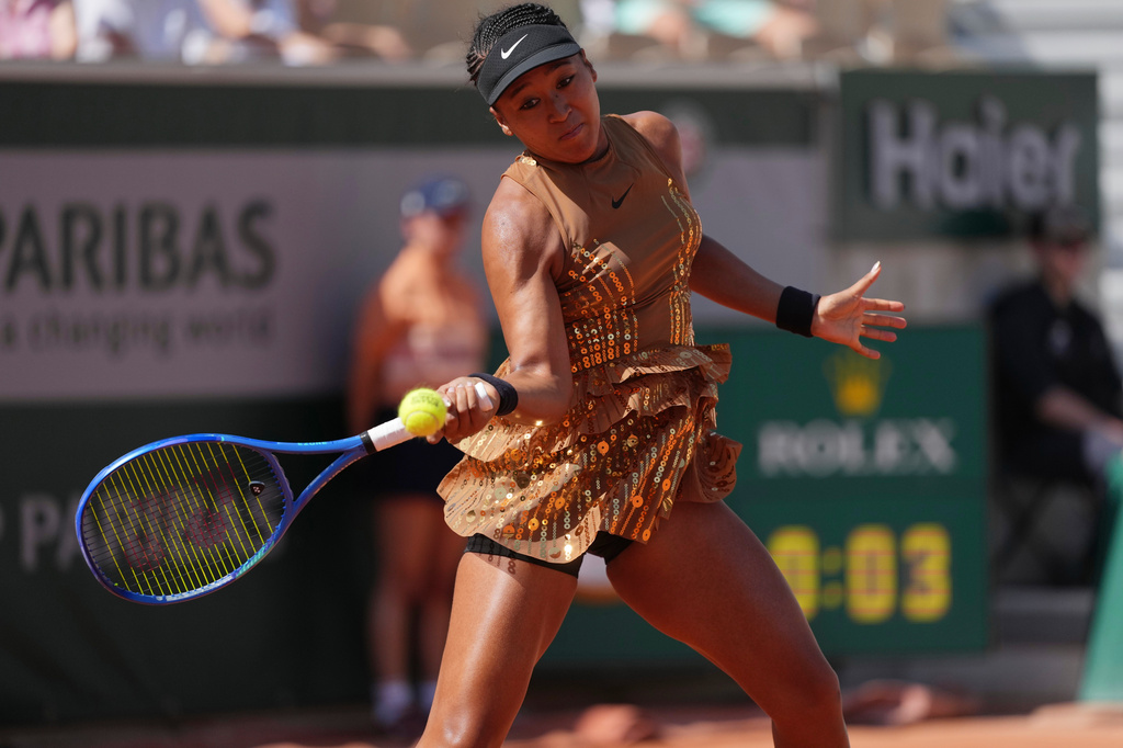 Naomi Osaka of Japan returns to Donna Vekic of Croatia during their second round women's singles tennis match at the French Open tennis tournament in Paris, Thursday, May 28, 2026. (AP Photo/Thibault Camus)