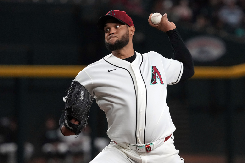Arizona Diamondbacks pitcher Eduardo Rodriguez throws against the Los Angeles Angels in the first inning of a baseball game, Wednesday, June 17, 2026, in Phoenix. (AP Photo/Rick Scuteri)