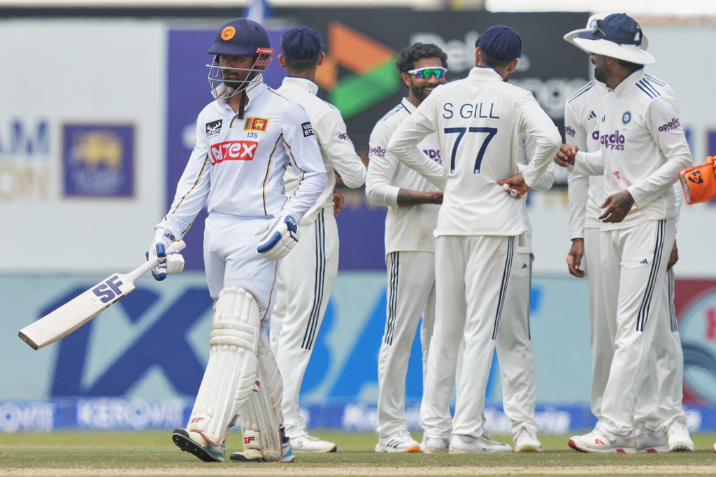 Sri Lanka's captain Dhananjaya de Silva walks off the filed after losing his wicket during the day three of the first cricket test match between Sri Lanka and India In Galle, Sri Lanka, Monday, Aug. 17, 2026. (AP Photo/Eranga Jayawardena)