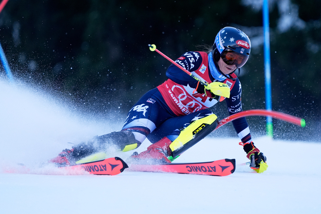 United States' Mikaela Shiffrin speeds down the course during an alpine ski, women's World Cup slalom in Semmering, Austria, Sunday, Dec. 28, 2025. (AP Photo/Giovanni Auletta)