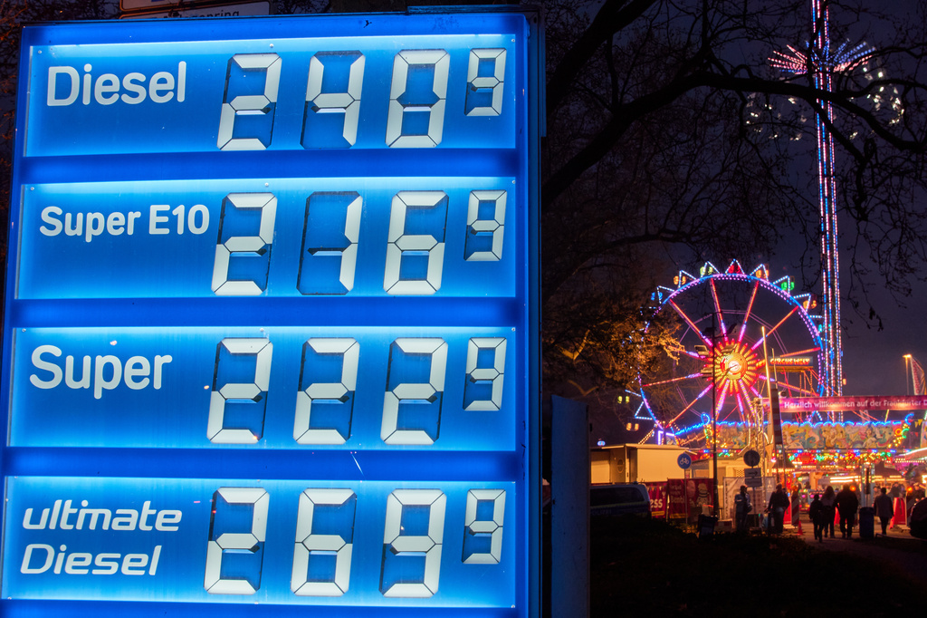 Gas prices are displayed near a ferris wheel in Frankfurt, Germany, Thursday, April 2, 2026. (AP Photo/Michael Probst)