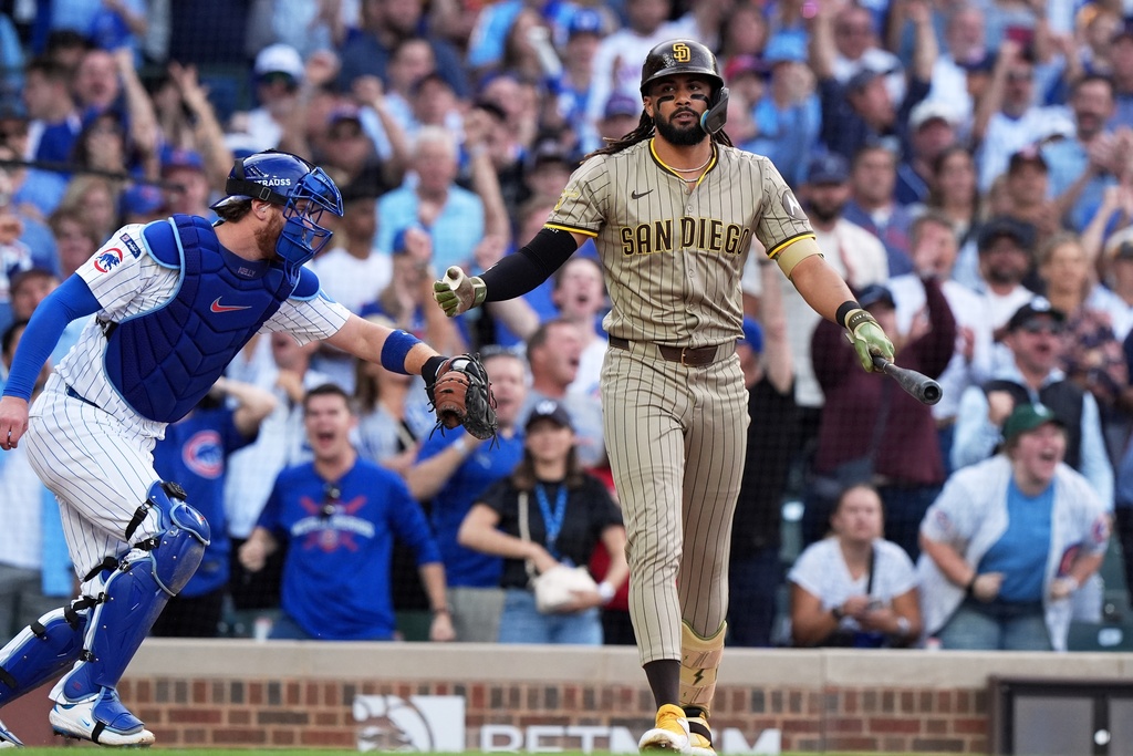 San Diego Padres' Fernando Tatis Jr. reacts after striking out during the third inning of Game 3 of a National League wild card baseball game against the Chicago Cubs Thursday, Oct. 2, 2025, in Chicago. (AP Photo/Nam Huh)