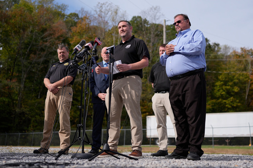 ATF agent Brice McCracken, second from right, speaks about the blast at Accurate Energetic Systems during a news conference Friday, Oct. 24, 2025, in McEwen, Tenn. (AP Photo/George Walker IV) ATF agent Brice McCracken, second from right, speaks about the blast at Accurate Energetic Systems during a news conference Friday, Oct. 24, 2025, in McEwen, Tenn. (AP Photo/George Walker IV)