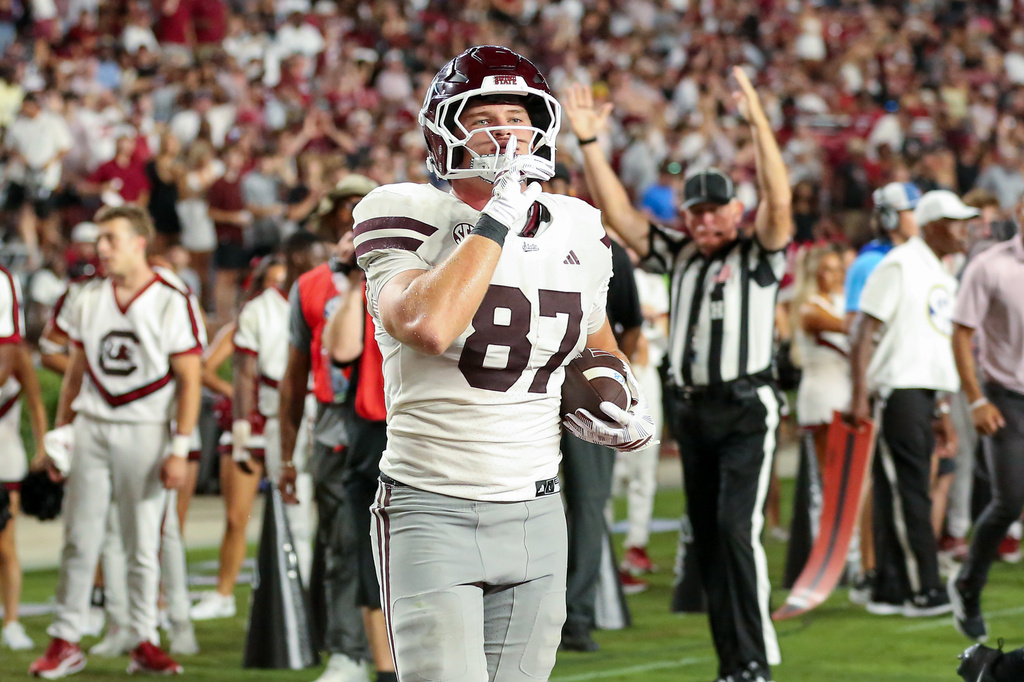 Mississippi State tight end Sam West (87) hushes the opposing fans after a 7-yard touchdown reception during the second half of an NCAA college football game against South Carolina Saturday, Sept. 19, 2026, in Columbia, S.C. (AP Photo/Artie Walker Jr.)