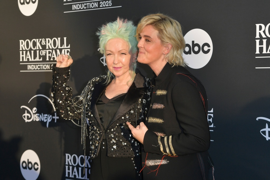 Cyndi Lauper, left and Brandi Carlile arrive at the 2025 Rock and Roll Hall of Fame Induction Ceremony on Saturday, Nov. 8, 2025, at L.A. Live in Los Angeles. (Photo by Richard Shotwell/Invision/AP)