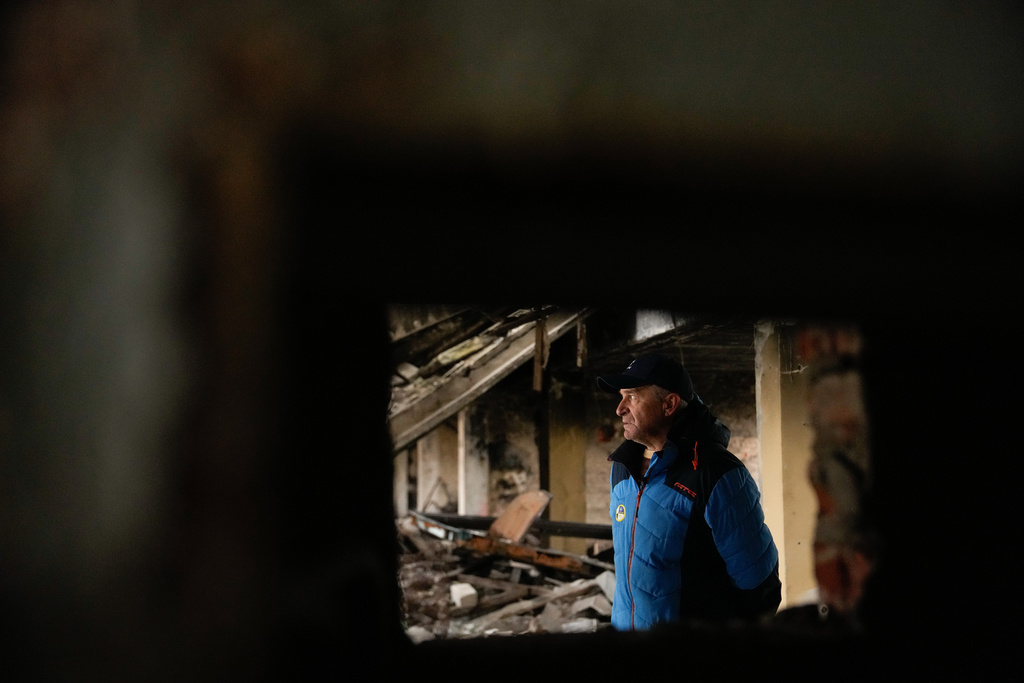 Biathlon coach Mykola Vorchak, 60, speaks during an interview with The Associated Press in the Chernihiv, Ukraine ski base, which was destroyed following Russian attacks in 2022, Thursday, Oct. 30, 2025. (AP Photo/Julia Demaree Nikhinson)
