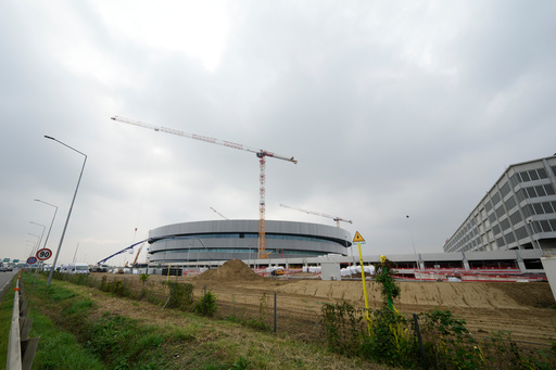 An outside view of the Santa Giulia Ice Hockey Arena, in Milan, where Ice Hockey discipline of the Milan Cortina 2026 Winter Olympics will take place, in Italy, Wednesday, Oct. 22, 2025. (AP Photo/Luca Bruno) An outside view of the Santa Giulia Ice Hockey Arena, in Milan, where Ice Hockey discipline of the Milan Cortina 2026 Winter Olympics will take place, in Italy, Wednesday, Oct. 22, 2025. (AP Photo/Luca Bruno)