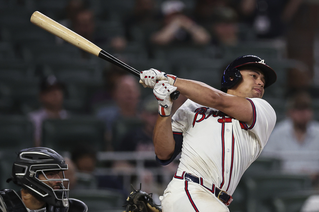 Atlanta Braves' Drake Baldwin hits a go-ahead two-run single in the eighth inning of a baseball game against the Chicago White Sox, Tuesday, Aug. 19, 2025, in Atlanta. (AP Photo/Colin Hubbard)