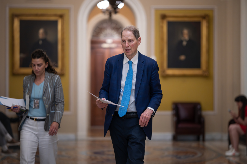 Sen. Ron Wyden, D-Ore., walks to the chamber during votes on the immigration enforcement funding package, at the Capitol in Washington, Thursday, June 4, 2026. (AP Photo/J. Scott Applewhite)