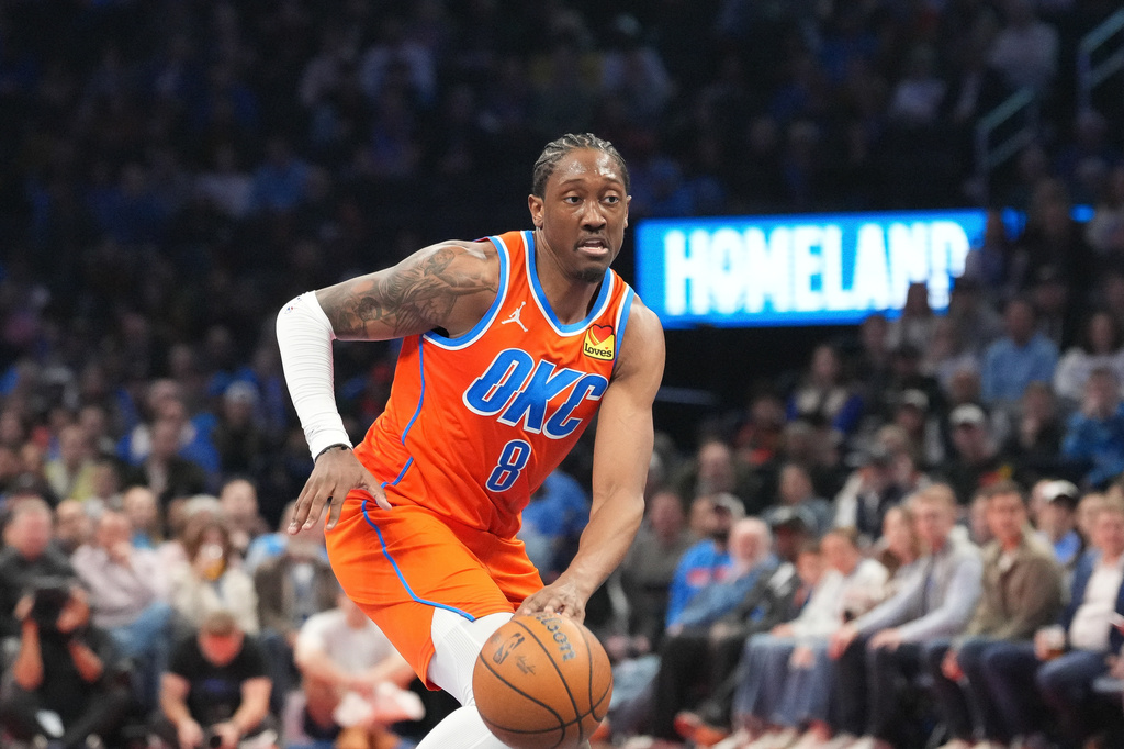 Oklahoma City Thunder guard Jalen Williams pushes down the court during the second half of an NBA Cup basketball game against the Phoenix Suns, Wednesday, Dec. 10, 2025, in Oklahoma City. (AP Photo/Kyle Phillips)