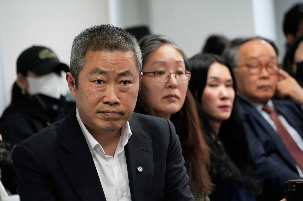 FILE - Peter Møller, left, Boonyoung Han, second from left, co-founders of the Danish Korea Rights Group, and adoptee Yooree Kim, second from right, attend a press conference at the Truth and Reconciliation Commission in Seoul, South Korea, March 26, 2025. (AP Photo/Ahn Young-joon, File)
