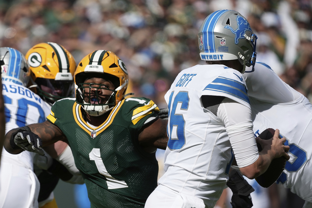 Green Bay Packers defensive end Micah Parsons (1) rushes Detroit Lions quarterback Jared Goff (16) during the first half of an NFL football game Sunday, Sept. 7, 2025, in Green Bay, Wis. (AP Photo/Morry Gash)