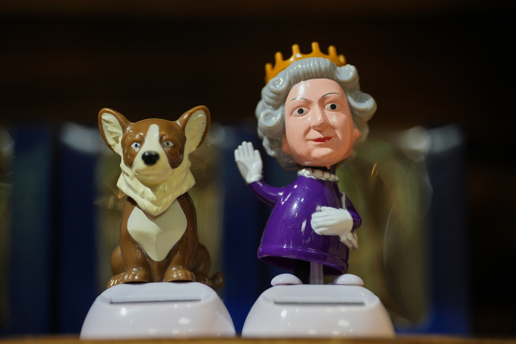 Bobblehead of late Queen Elizabeth II is on display for sale at a souvenirs shop in London, on April 17, 2026. (AP Photo/Kin Cheung)