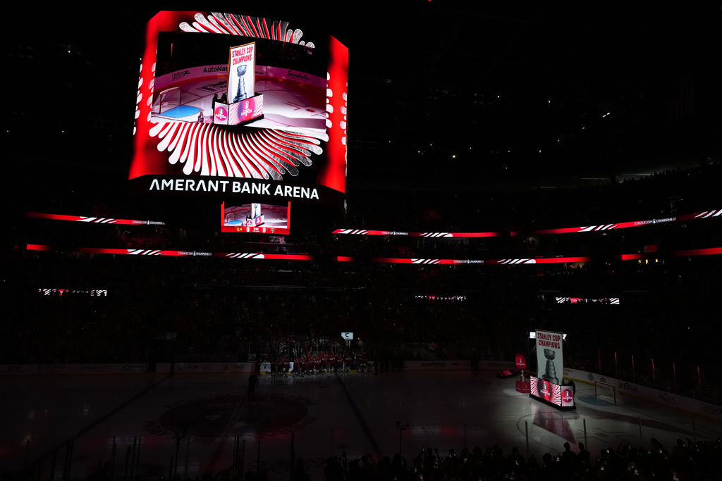 The 2025 Stanley Cup banner is raised over the arena ahead of the Florida Panthers' home opener NHL hockey game against the Chicago Blackhawks, Tuesday, Oct. 7, 2025, in Sunrise, Fla. (AP Photo/Rebecca Blackwell)
