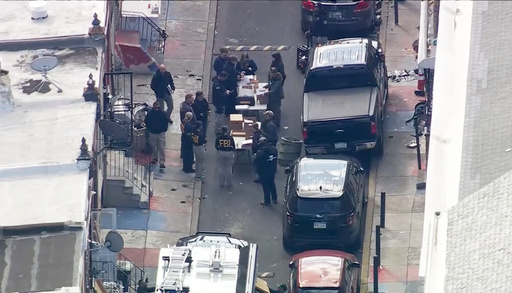 FBI agents are outside a building after a raid in the Kensington section of Philadelphia on Friday, Oct. 24, 2025. (WPVI via AP) FBI agents are outside a building after a raid in the Kensington section of Philadelphia on Friday, Oct. 24, 2025. (WPVI via AP)