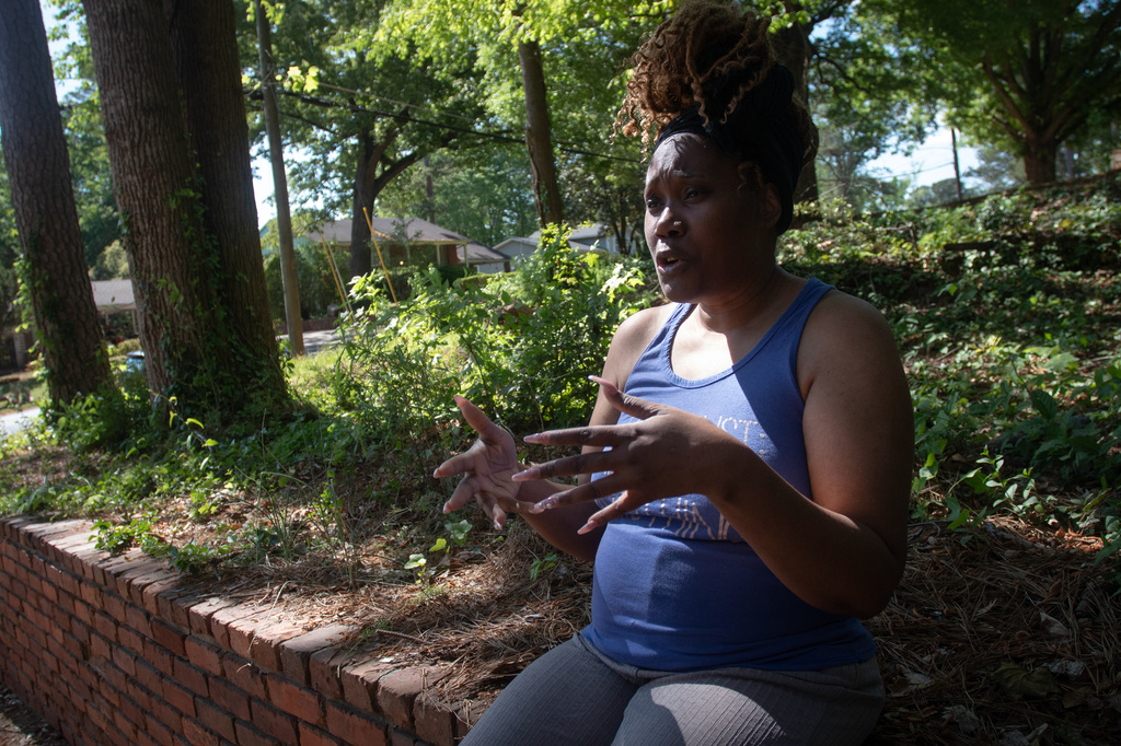 Lakisha Mckinzie discusses her ex-housemate, Olaolukitan Adon Abel, who is charged in a string of deadly shootings, in Decatur, Ga., on Friday, April 17, 2026. (AP Photo/Ron Harris)