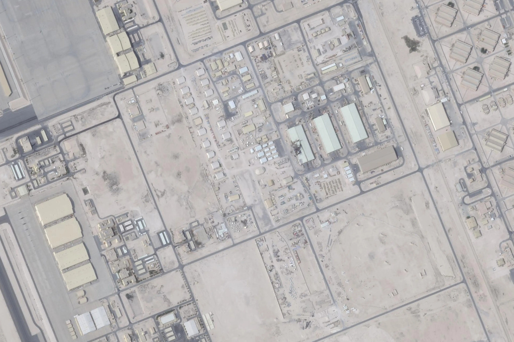 This March 15, 2026, satellite photo from Planet Labs PBC shows damage after an Iranian attack at Al Udeid Air Base, Qatar. (Planet Labs PBC via AP)