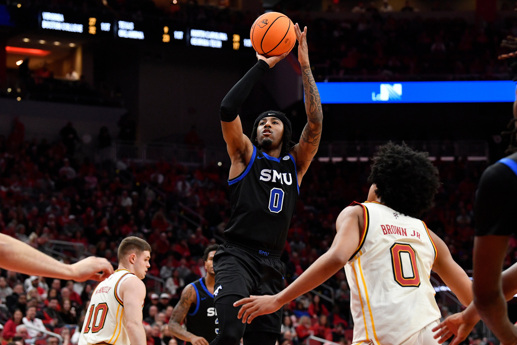 SMU guard B.J. Edwards (0) shoots over Louisville guard Mikel Brown Jr. (0) during the first half of an NCAA college basketball game in Louisville, Ky., Saturday, Jan. 31, 2026. (AP Photo/Timothy D. Easley)